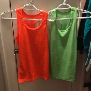 2 reebok tank tops.